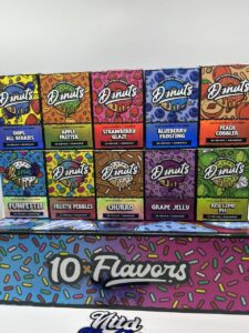 Fryd Donuts flavor lineup including Churro, Strawberry Glaze, Grape Jelly and Fruity Pebbles packaging